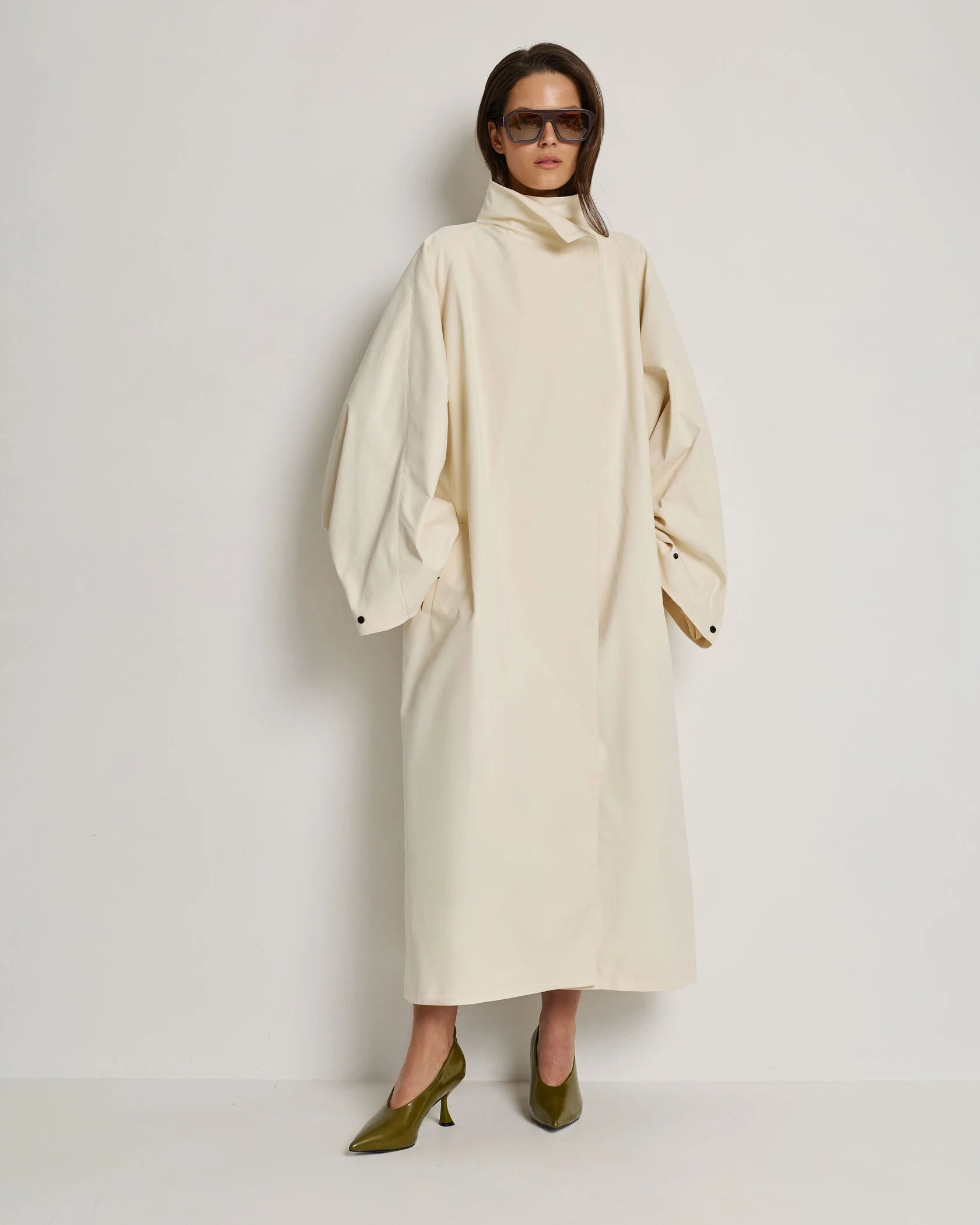 Trench coat with a stand-up collar, milky